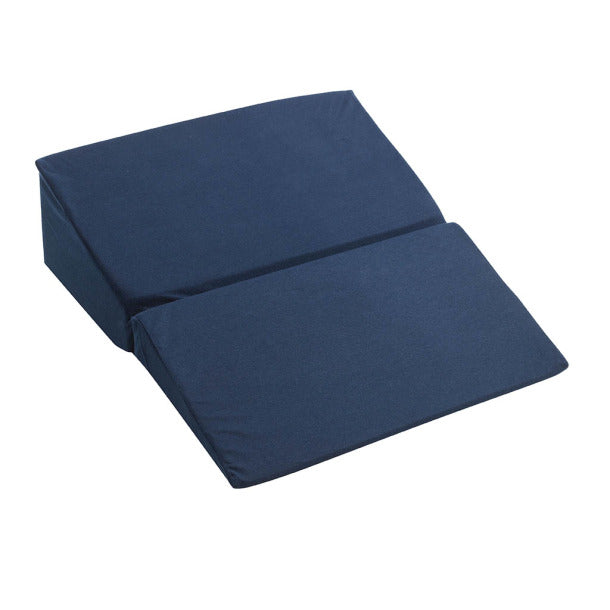 Folded navy blue bed wedge on a white background
