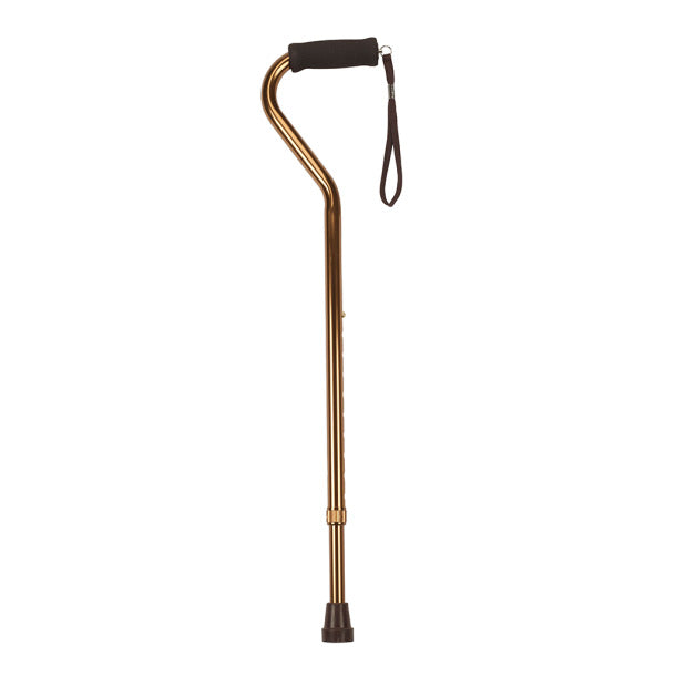 Gold walking cane with black handle on a white background
