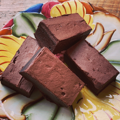 Chocolate brownies on a decorative plate 