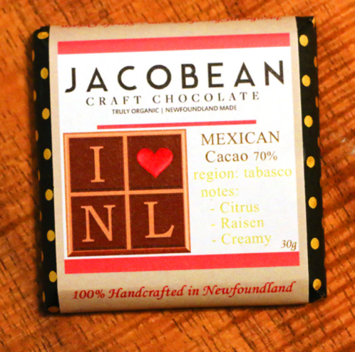 Jacobean craft chocolate bar with label on a wooden surface