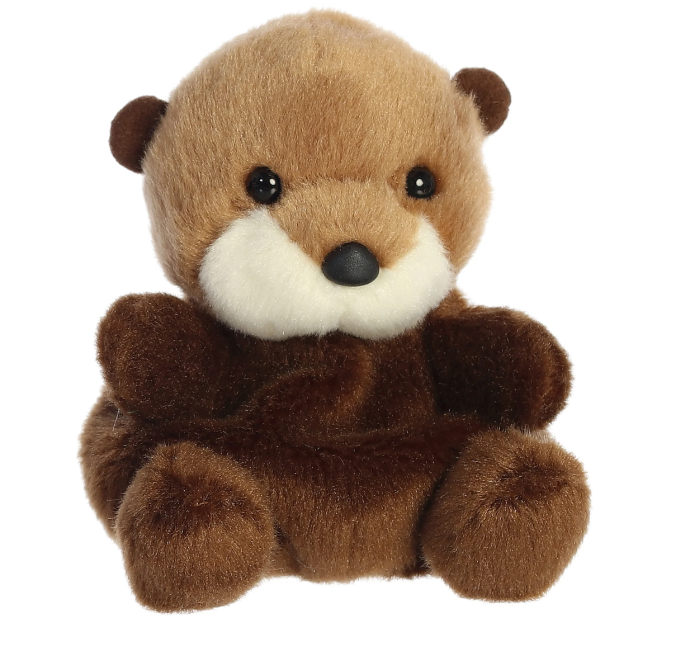 Plush toy otter on a white background