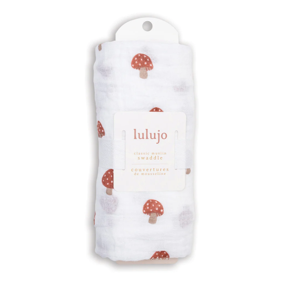 Lulujo mushroom-patterned swaddle blanket in packaging on a white background