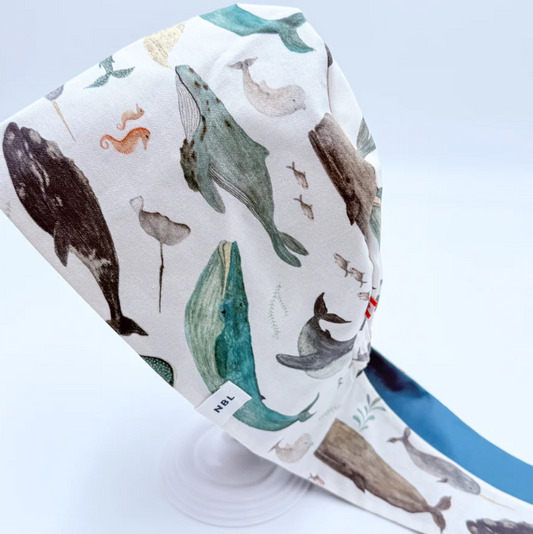 Fabric with whale pattern on a white background